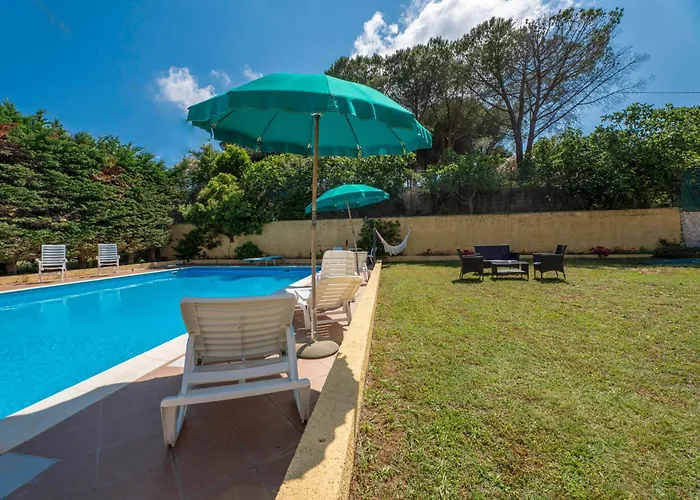 Mimosa Con Piscina - Goelba Marmi